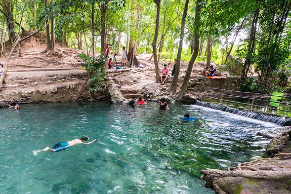 Baan Tha Chang Spring: A natural spring park with a swimming pool and pavilion, perfect for family water play and leisure.