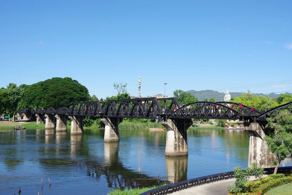 River Kwai Bridge
The famous railway bridge built by prisoners of war during World War II, spanning the River Kwai, has profound historical significance and a light show at night. It is one of Kanchanaburi's most iconic landmarks.
