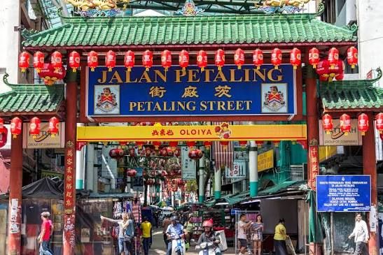 Petaling Street, the heart of Kuala Lumpur's Chinatown. It is famous for its lively market, delicious street food, bargain shopping, and vibrant local culture.