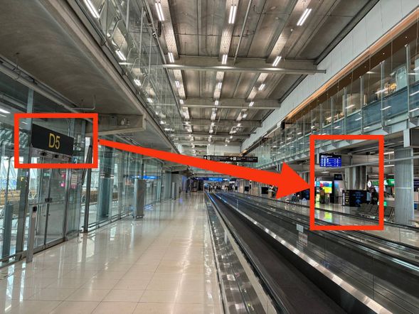 The 'VISA ON ARRIVAL' sign opposite Gate D5-0