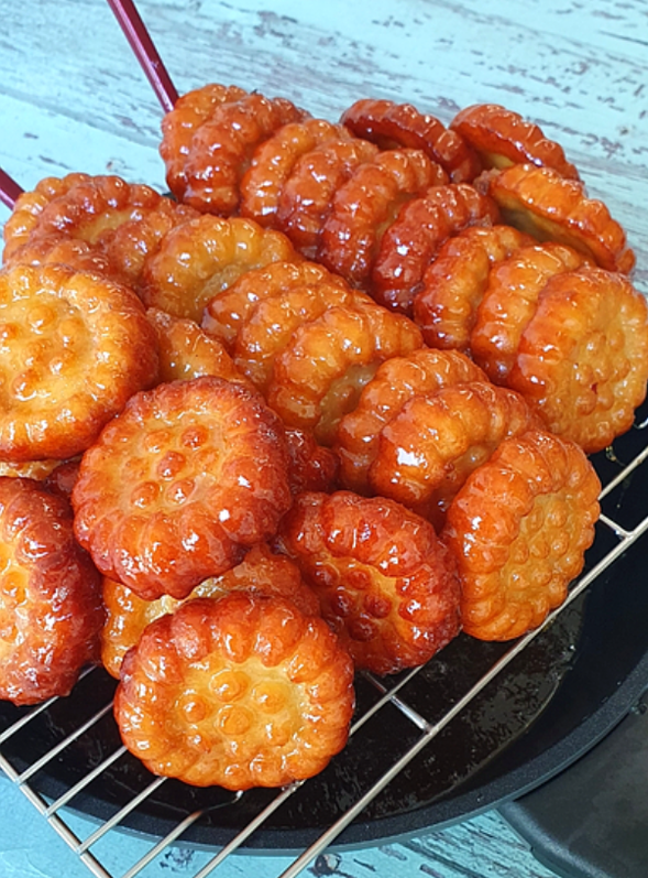 冷卻同時滴出過多的蜂蜜