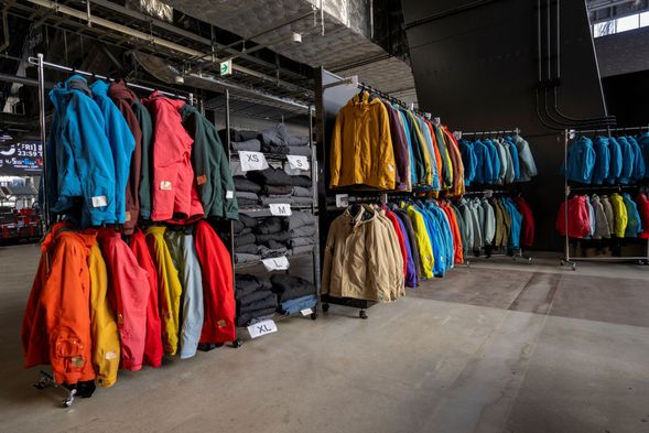 Please put on your ski wear first. It will help keep you warm and protect you from the cold.