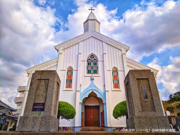 09:30 AM Mizunoura Church - Striking white wooden church blending Romanesque, Gothic, and Japanese styles.