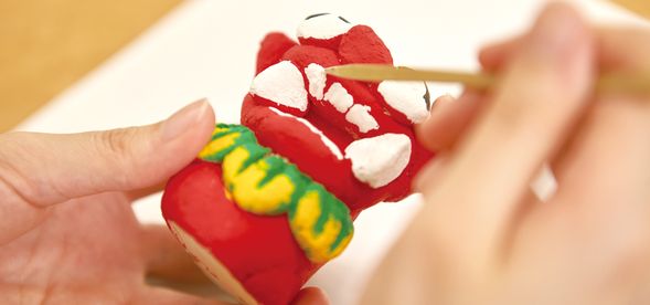 しっくいシーサー絵付け体験作品例
