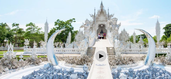 Arrive at the stunning White Temple and admire its natural surroundings.